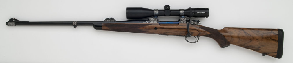7mm STW left handed custom rifle with Celtic engraving