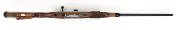 Left Handed 7mm stw premium rifle with engraved leopard