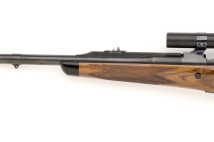  416 Rigby custom rifle with point pattern checkering and barrel band