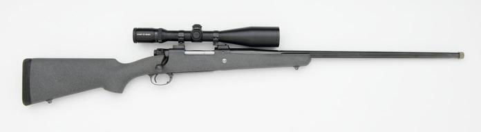 Syn-fle Charcoal gray synthetic rifle with fluted barrel in 7mm stw with Schmidt & Bender scope