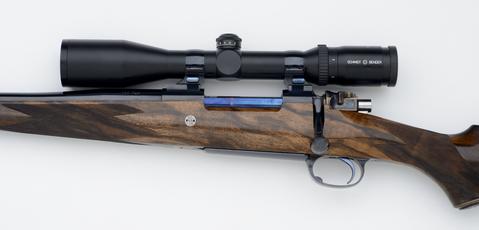  280 custom rifle with nitre blued bolt and color cased shroud